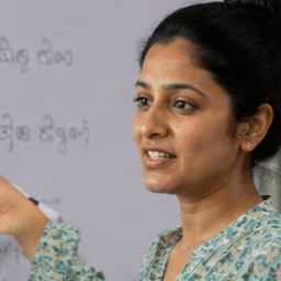Teacher at a whiteboard